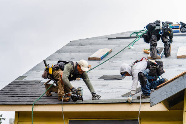 Professional Flat Roof Repair technician working in Beverly, OH